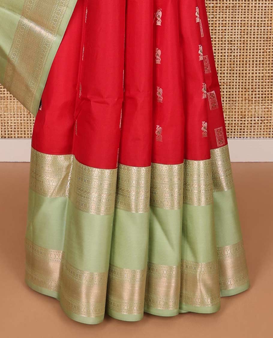 Red buttas silk saree with contrast korvai border of rekk, paun, muthu design & floral design pallu
