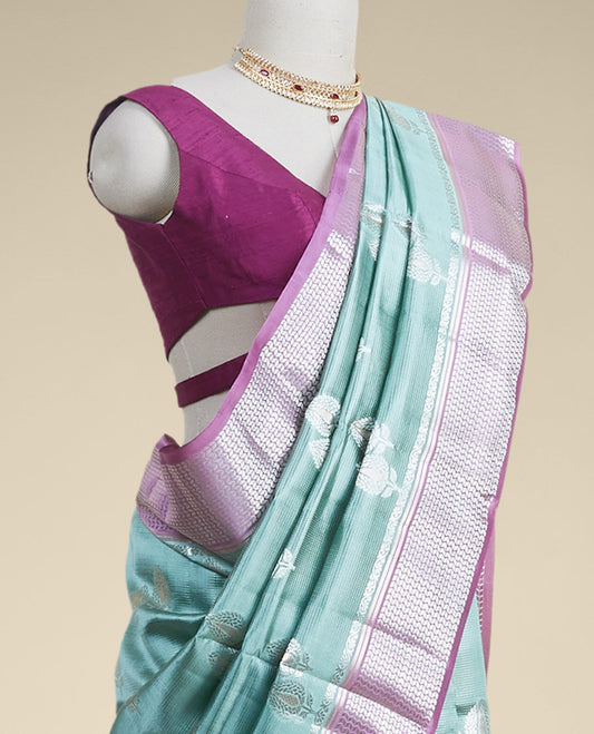 Green  floral motifs dupion silk saree with contrast intricate zari design border