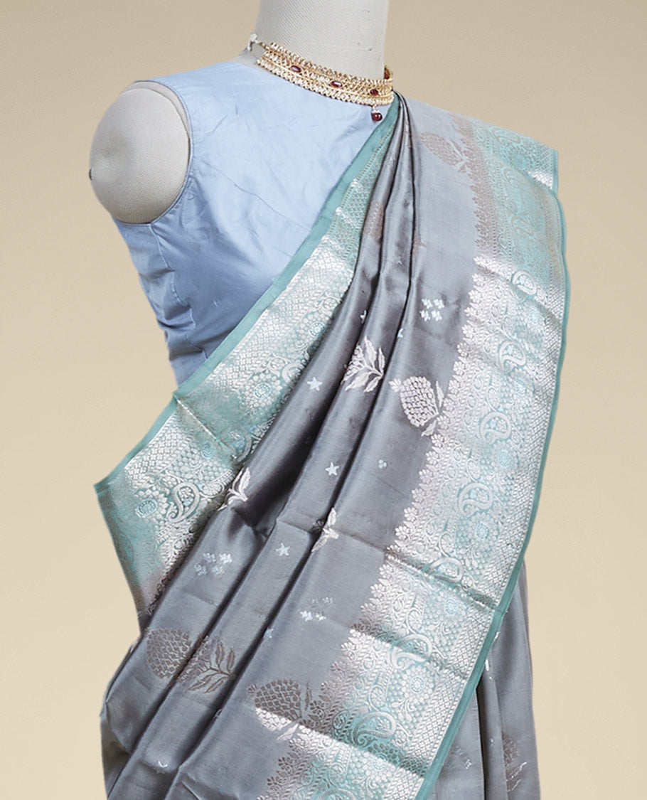 Gery floral motifs dupion silk saree with contrast intricate zari border