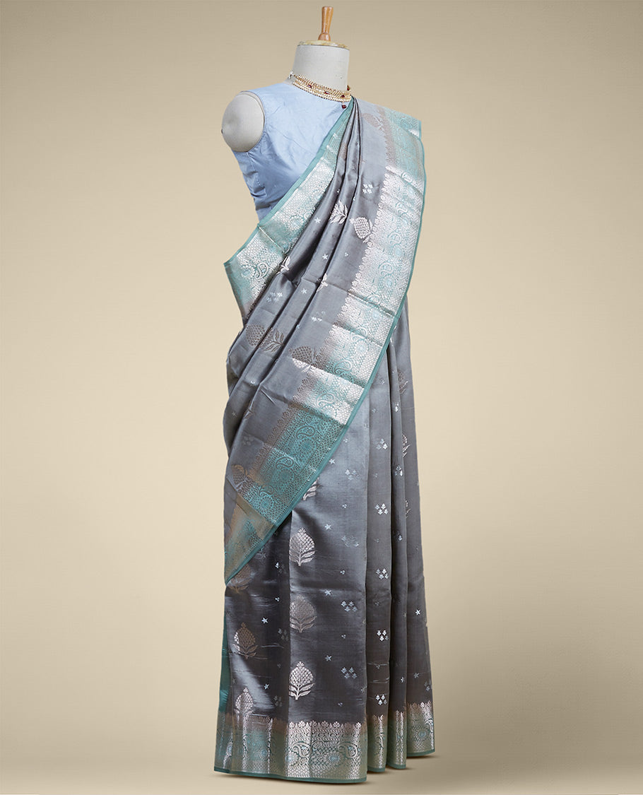 Gery floral motifs dupion silk saree with contrast intricate zari border