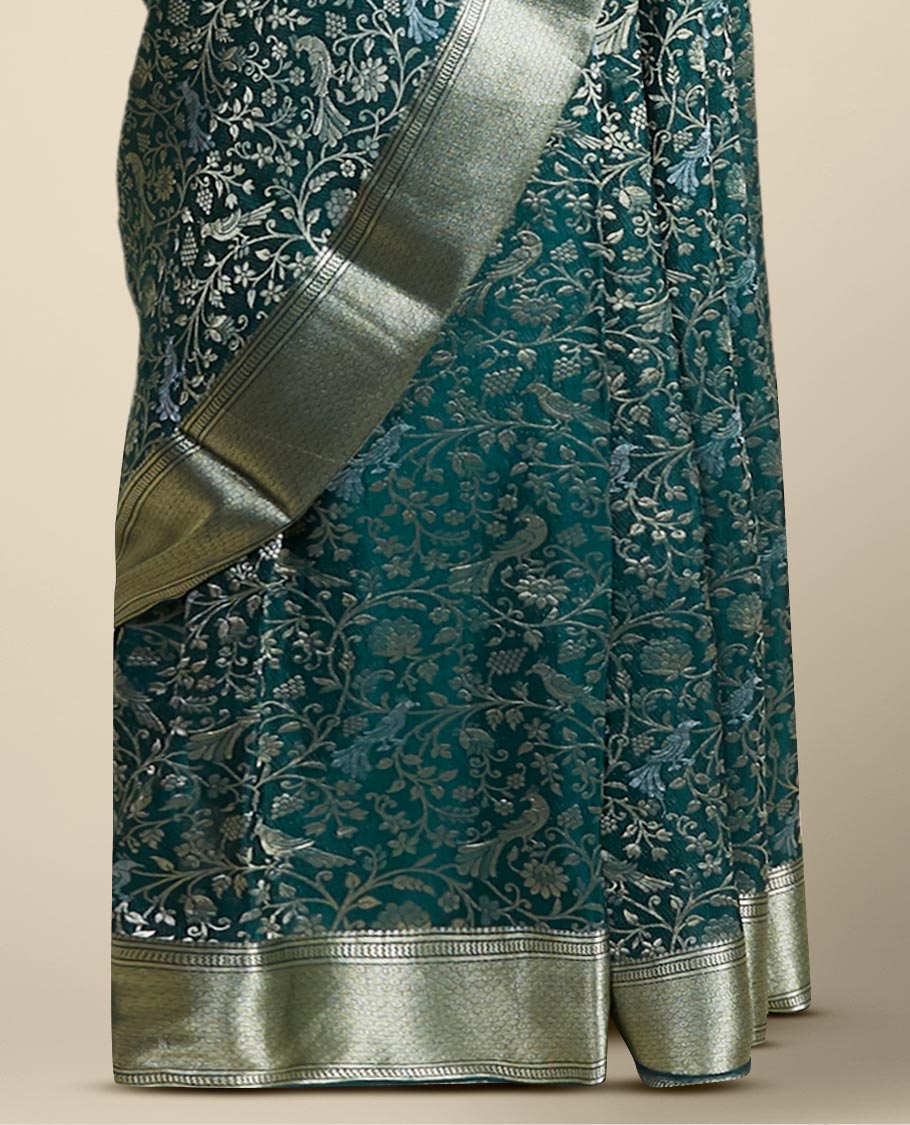 Green floral embroidery pure crepe saree with self intricate zari design border