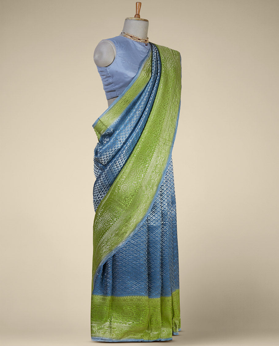 Blue argyle pattern pure crepe saree with intricate floral zari border
