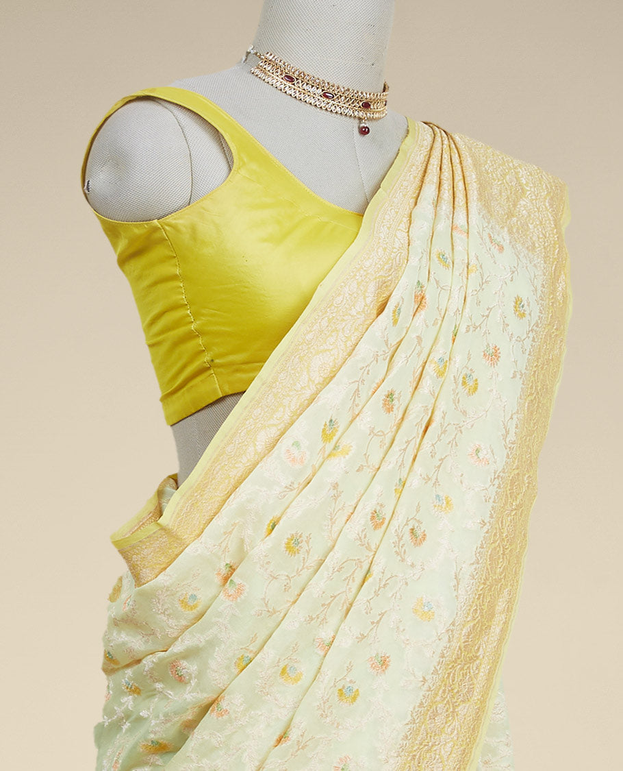 Yellow floral vine design banaras georgette saree with contrast inticate zari border