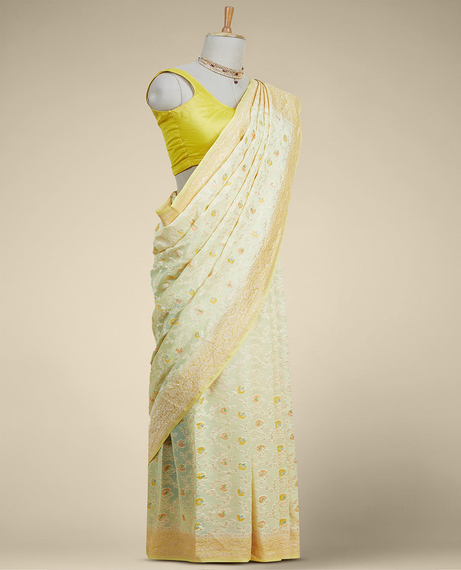 Yellow floral vine design banaras georgette saree with contrast inticate zari border
