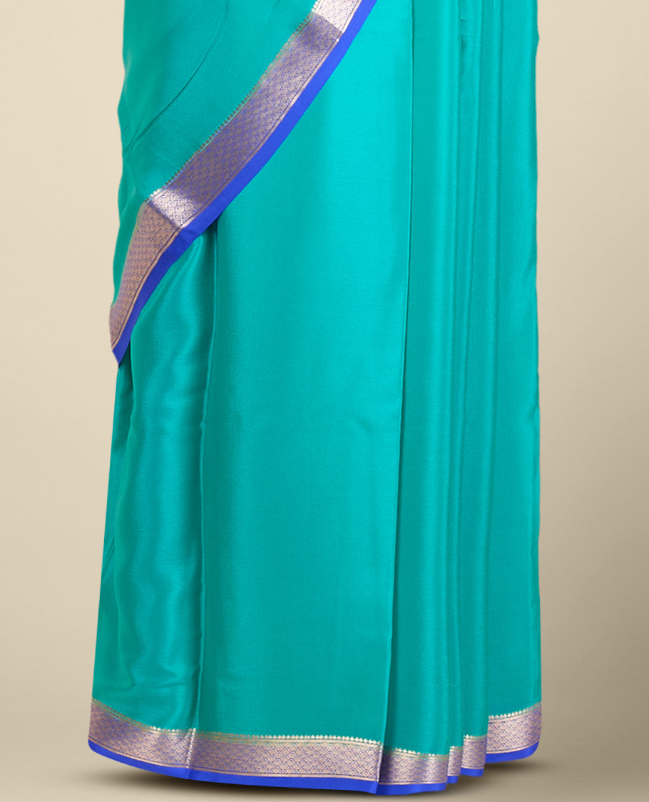Blue plain mysore silk saree with self zari design border