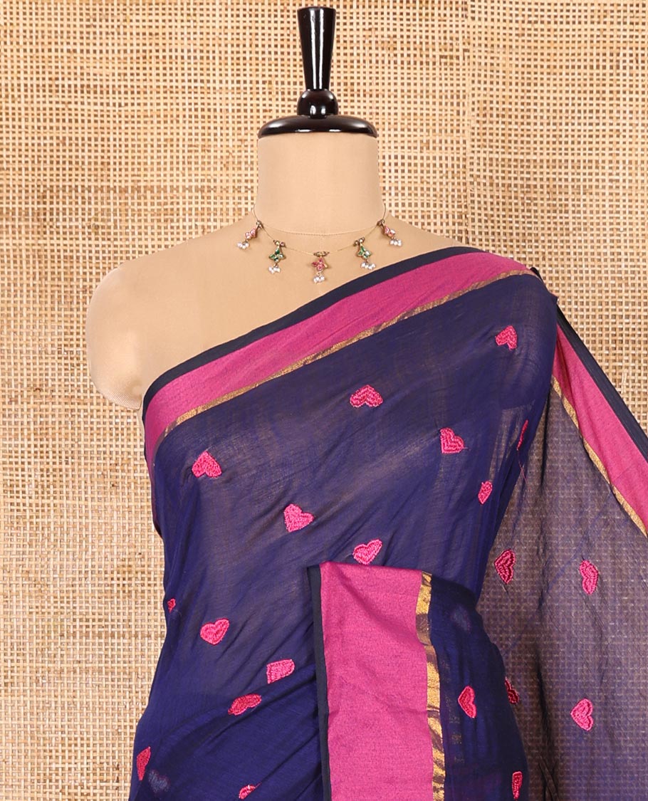 Navy Blue Khadi Mul Cotton Saree Prettified with Heart Motifs Embroidery All Over Its Body, Complemented by a Contrast Plain Border, Pallu Steeped with Heart Motifs Embroidery, and Paired with a Matching Blouse
