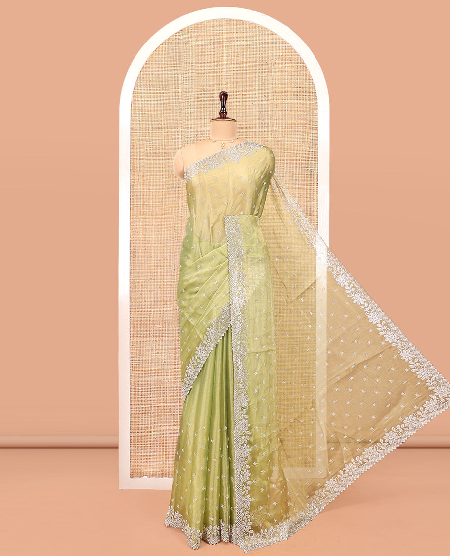 Green Designer Saree, Gleamed up with Stone Work All Over Its Body, Highlighted by Stone Embroidered Border, And Paired with a Matching Blouse