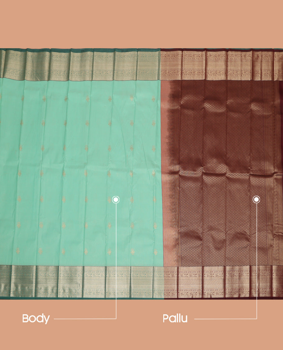 Pale Green Budget Silk Saree, Sparsely Sparked with Zari Buttas and Stripes All Over Its Body, Highlighted by Contrast Traditional Zari Designs Woven Border, Grand Contrast Jaal Pallu and Paired with a Contrast Blouse