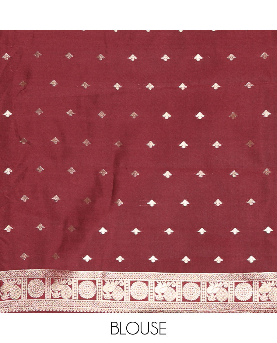 Rust orange zari buttas kanchi silk saree, contrast traditional rettai pettu border of peacock chakram, intricate pallu, and a zari design pallu