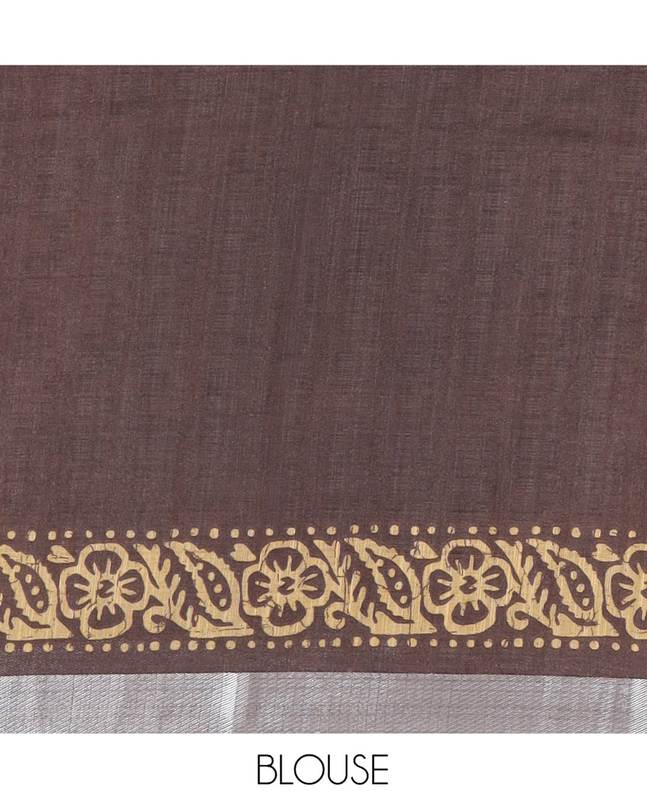 Chikku Jute Linen Saree Features Batik Floral Print, Zari Border, Printed Pallu, Contrast Blouse