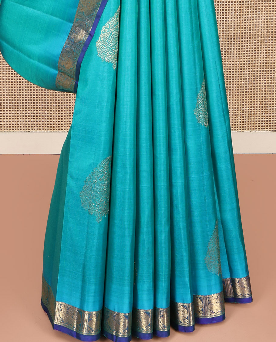 Blue Kanchipuram Silk Saree, Woven with Zari Buttas on Its Body, Complemented by Contrast Border of Annam Designs, Grand Jaal Design Pallu, and Paired with a Contrast Blouse