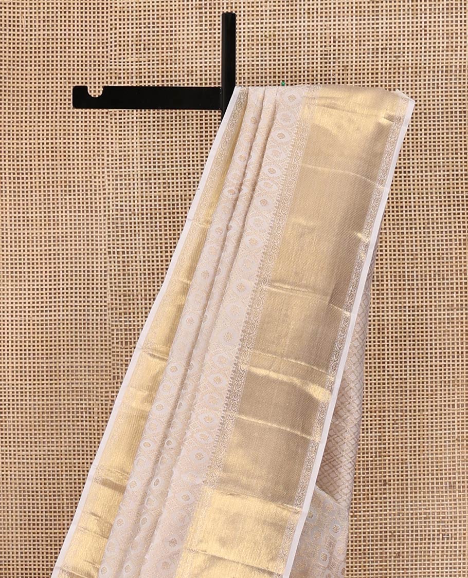 Off-White Kanchipuram Wedding Silk Saree, Finely Woven with Jacquard Design On Its Body, Highlighted by Zari Floral Creeper Design Border, Grand Pallu and Paired with a Matching Blouse