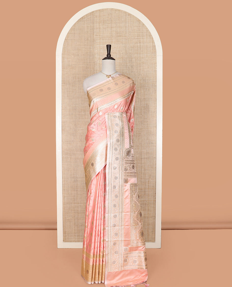 Peach jaal and zari buttas banarasi silk saree, traditional zari border of stone work, and pallu of intricate designs and stone work