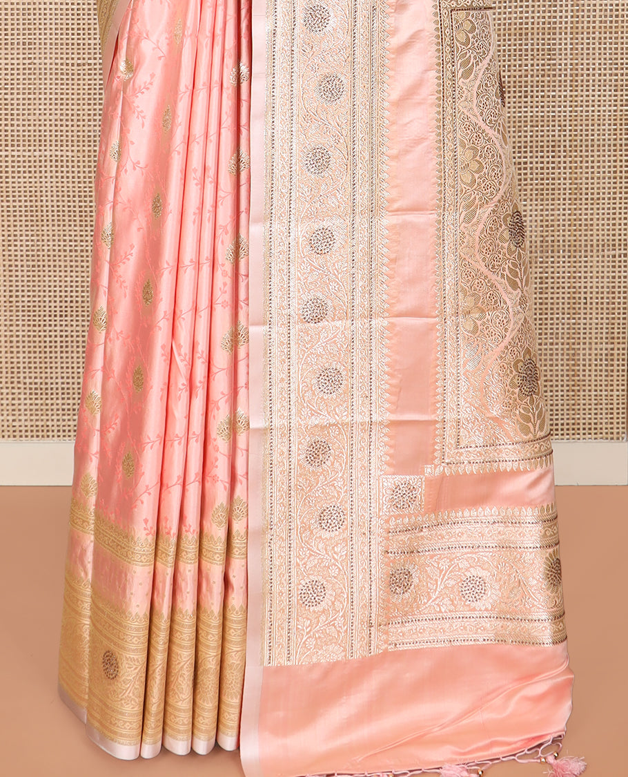 Peach jaal and zari buttas banarasi silk saree, traditional zari border of stone work, and pallu of intricate designs and stone work