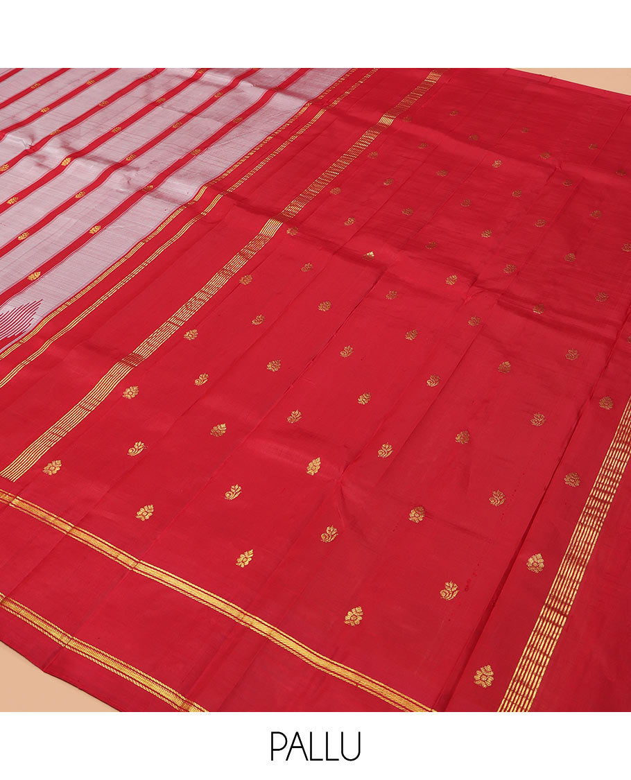 Grey Kanchipuram Silk Saree Featuring Zari Buttas, Complemented by a Contrast One-Sided Thazampoo Rekku Rettai Pettu Border, Zari Design Pallu, and a No Blouse