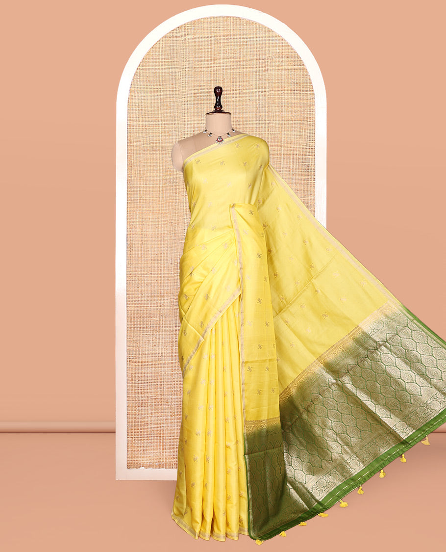 Light Yellow Satin Silk Saree, Subtly Sparkled with Zari Buttas, a Subtle Piping Border, Complemented by a Contrast Intricately Designed Pallu, and a Contrast Blouse