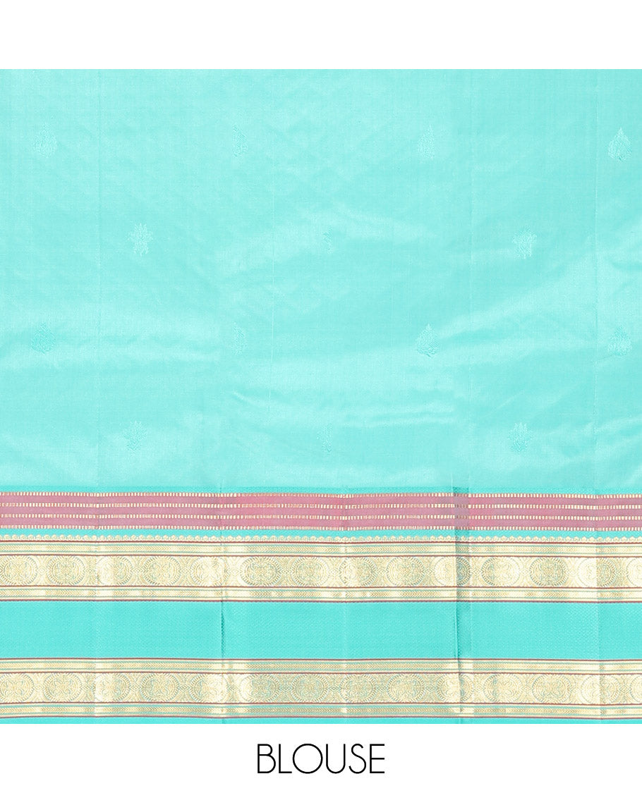 Purple Vasundhara Silk Saree, Beautifully Bedecked with Kamalam Buttas on Its Body, Complemented by a Captivating Contrast Border of Muthu, Chakram, and Mayil Kann Designs, Grand Jaal Pallu, and Paired with a Contrast Blouse