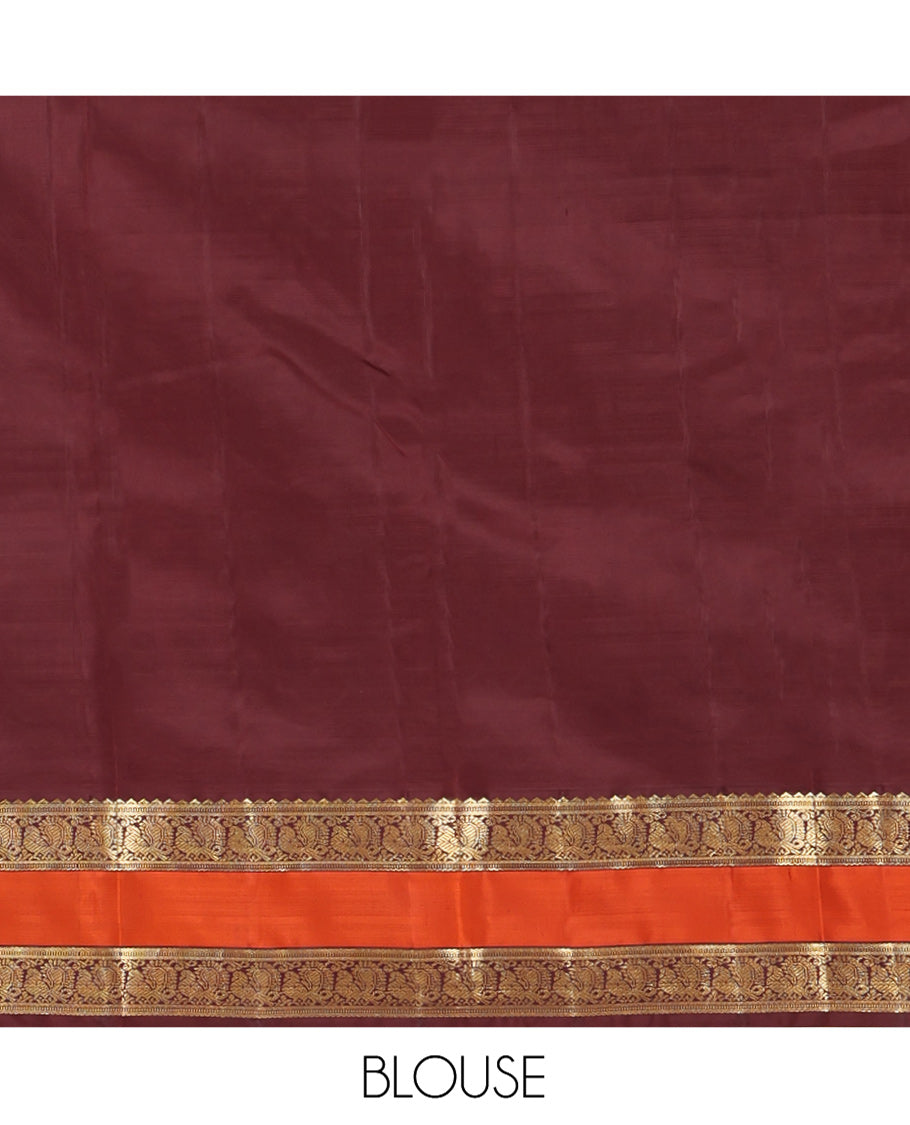 Pink Vasundhara Silk Saree, Sparsely Sparkled with Zari Buttas All Over Its Body, Complemented by a Contrast Rettai Pettu Border of Rekku, Muthu, and Yaanai Designs, Grand Geometric Pallu, and Paired with a Contrast Blouse