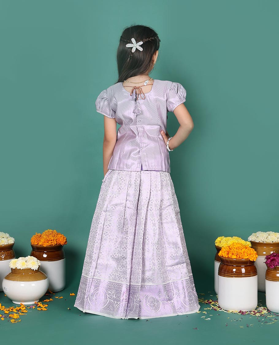 Lavender art silk readymade pavadai set, jacquard with traditional zari border skirt, and jacquard embroidered puff-sleeve blouse