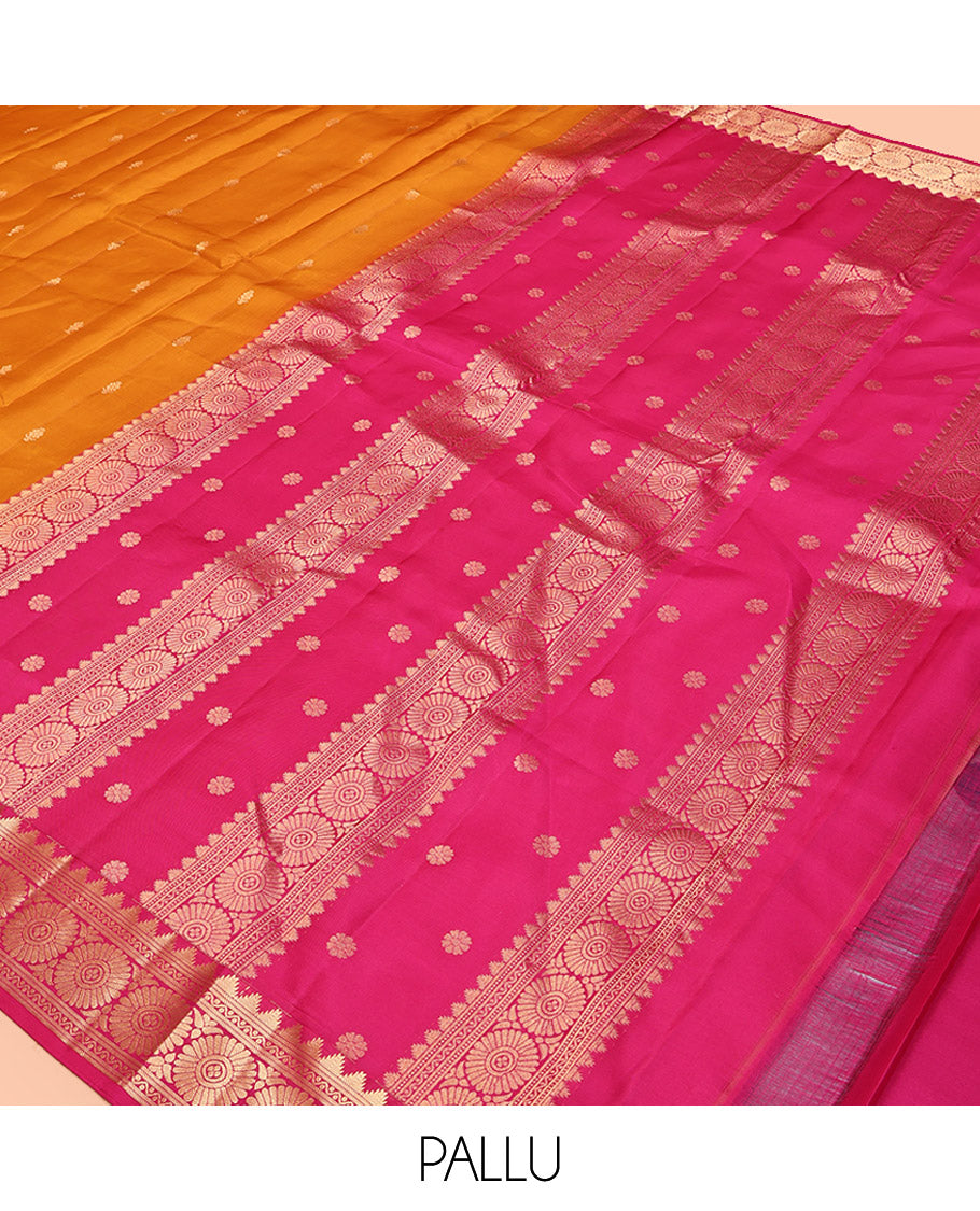 Orange Kanchipuram Silk Saree, Woven with Zari Buttas All Over Its Body, Complemented by a Contrast Border of Thazampoo Rekku, Banaras, Neli, and Chakram Designs, Intricately Designed Pallu, and Paired with a Contrast Blouse
