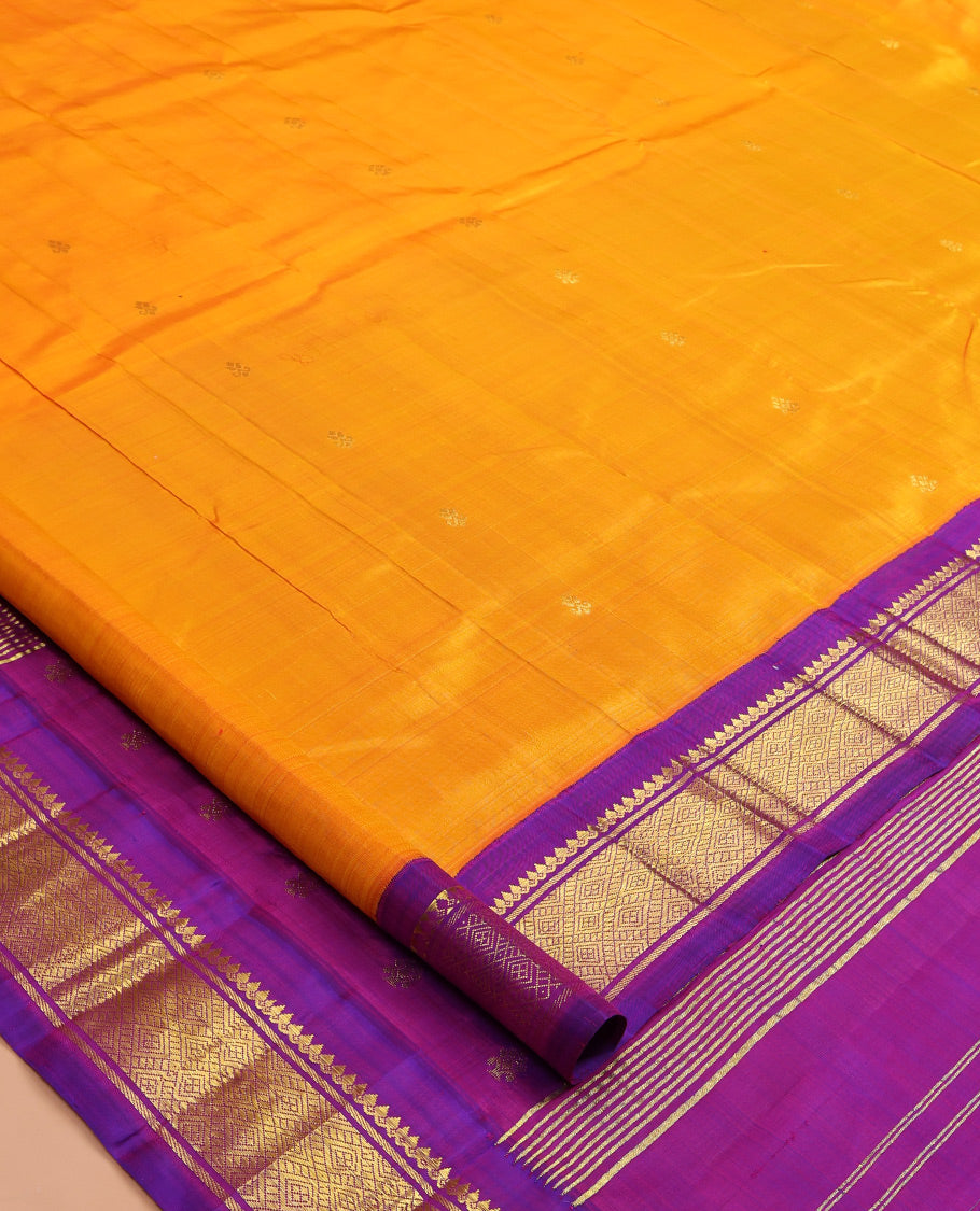 Yellow Kanchipuram Silk Saree, Gleamed Up with Zari Buttas, a Contrast Korvai Border of Thilakam Mokku, Banaras, and Jaal Designs, Zari Woven Pallu, and No Blouse