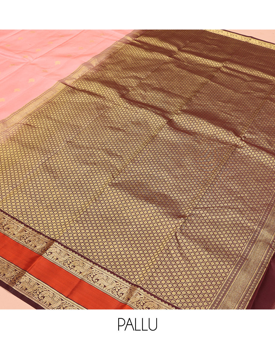 Pink Vasundhara Silk Saree, Sparsely Sparkled with Zari Buttas All Over Its Body, Complemented by a Contrast Rettai Pettu Border of Rekku, Muthu, and Yaanai Designs, Grand Geometric Pallu, and Paired with a Contrast Blouse