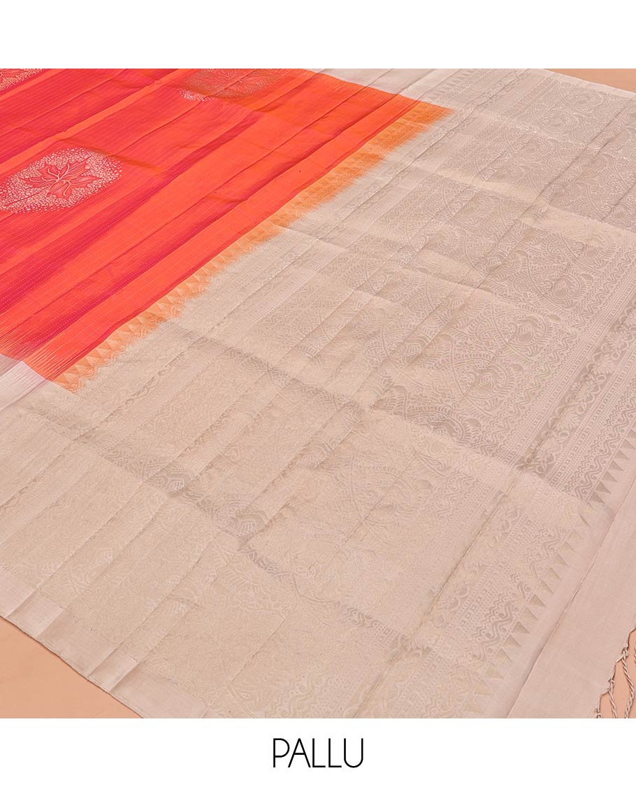 Orange Mayuri Soft Silk Saree, Enriched with Zari Buttas All Over Its Body, Complemented by Contrast Border of Zari Buttas, Intricately Designed Pallu and Paired with a Contrast Blouse