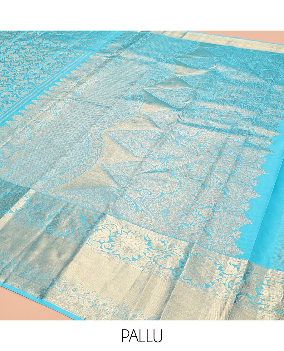 Blue Kanchipuram Wedding Silk Saree, Embellished with Jacquard Design, a Zari Border of Kodi Visiry Designs, Intricately Designed Pallu, and a Matching Blouse