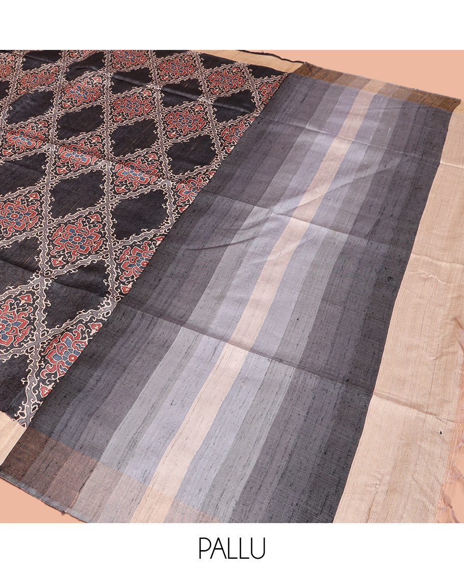 Black Tussar Silk Saree, Artfully Detailed with Ajrakh-Style Jaal Design on Its Body, a Subtle Border, Ombre-Style Striped Pallu, and Paired with a Contrast Blouse