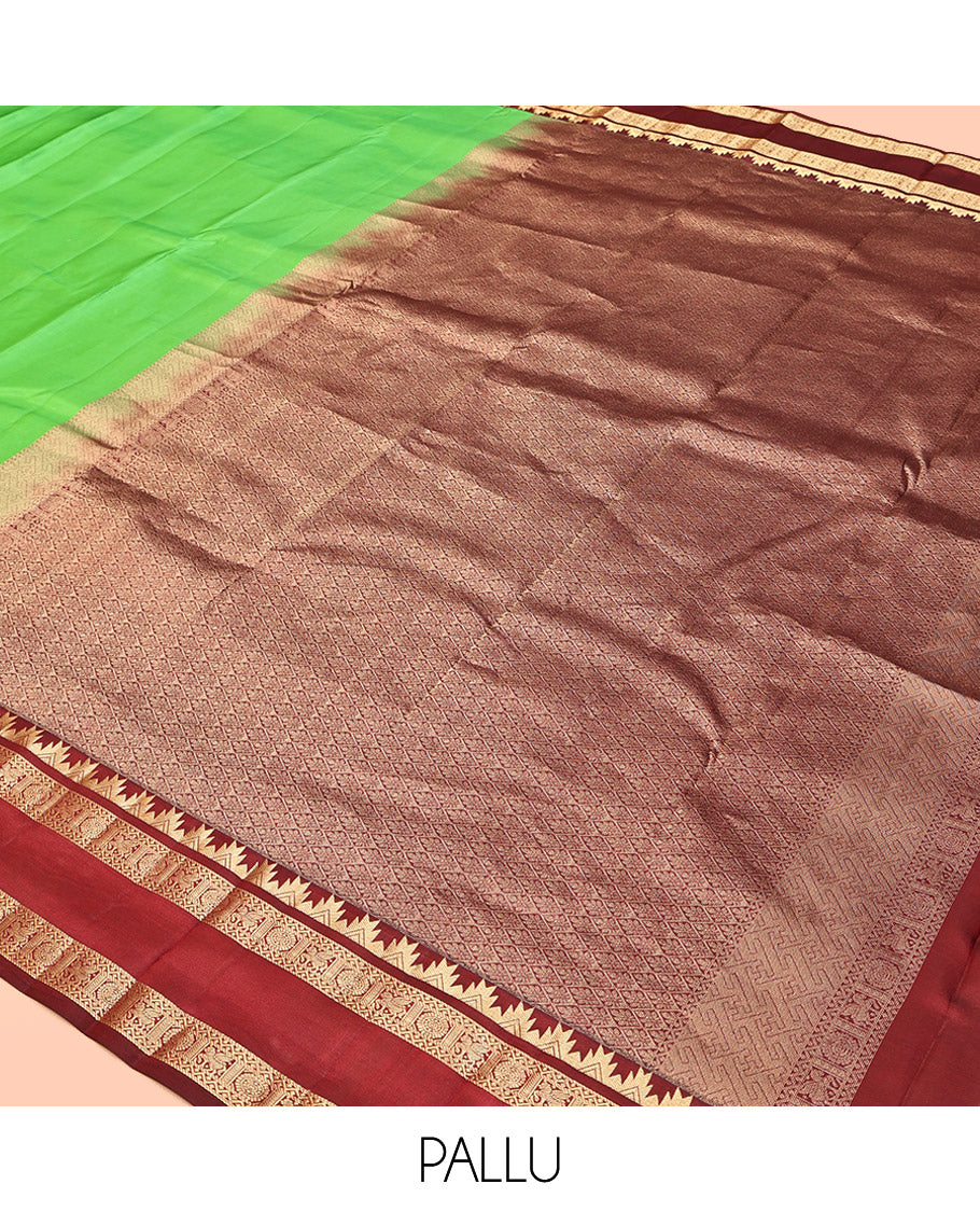 Green Plain Kanchipuram Silk Saree, Complemented by a Contrast Rettai Pettu Border of Thazampoo Rekku, Neli, Kuthirai, and Chakram Designs, Jaal Pallu, and a Contrast Blouse