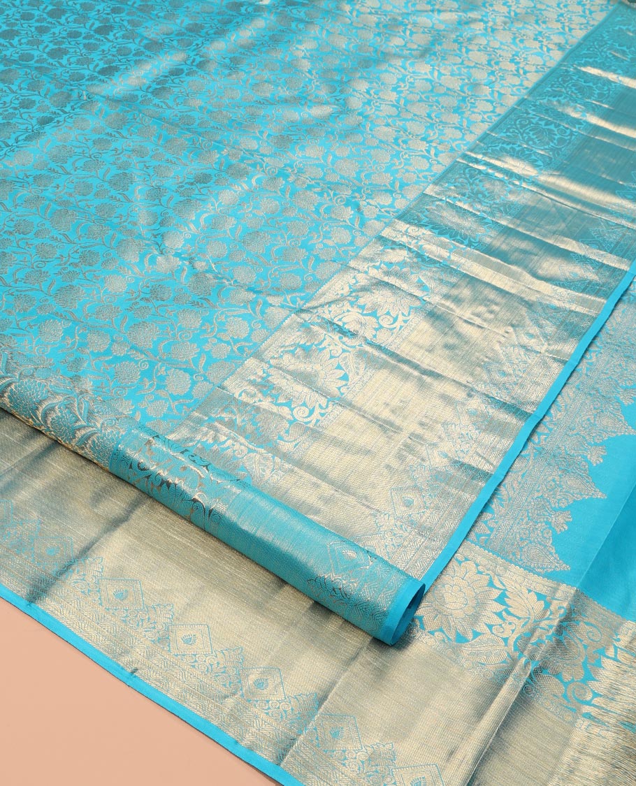 Blue Kanchipuram Wedding Silk Saree, Embellished with Jacquard Design, a Zari Border of Kodi Visiry Designs, Intricately Designed Pallu, and a Matching Blouse
