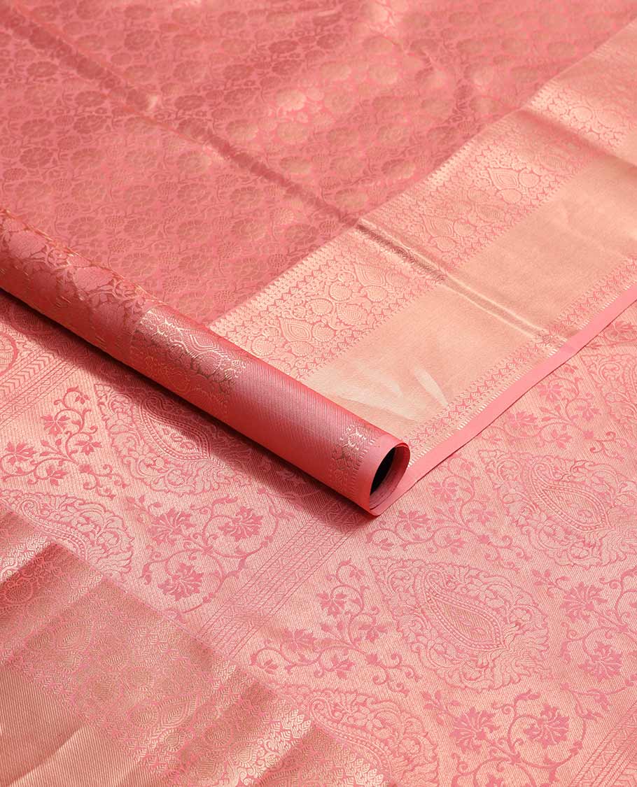 Peach floral jacqaurd kancheepuram silk saree with self intricate zari design border & floral design pallu