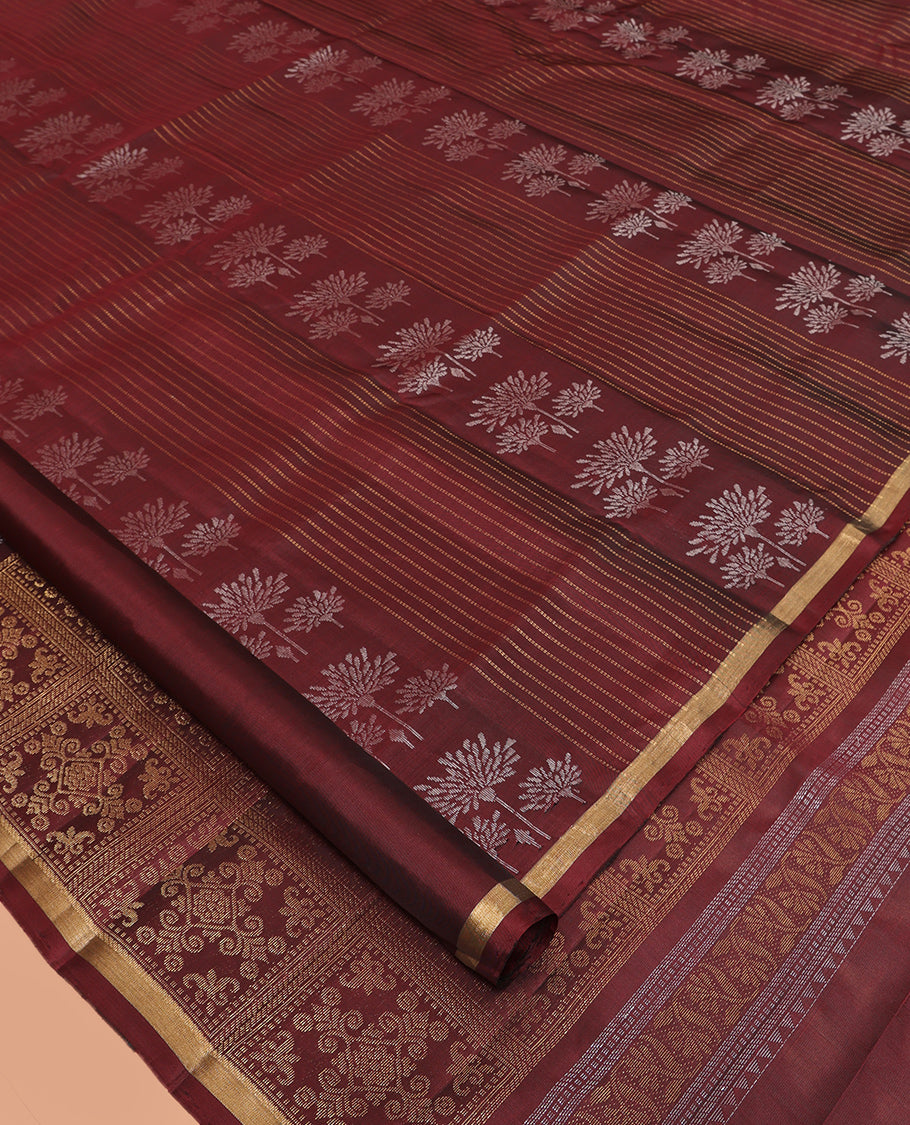 Brown Mayuri Lite Silk Mix Saree, Showcasing Floral Zari Buttas and Stripes, a Piping Border, a Grand Pallu, and a Matching Blouse