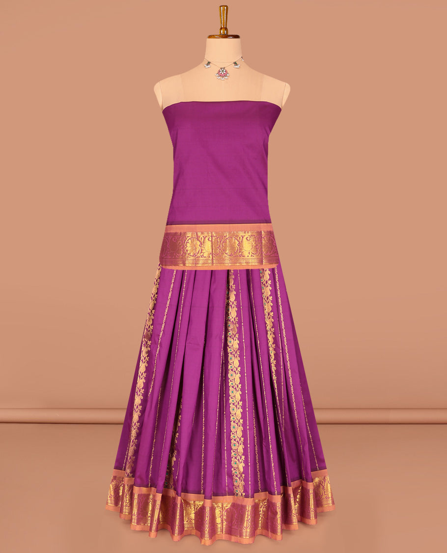 Purple Art Silk Pavadai Material Set, Embellished with Zari Designs on Its Skirt, Complemented by a Contrast Paisley-Floral Zari Border, and a Matching Blouse