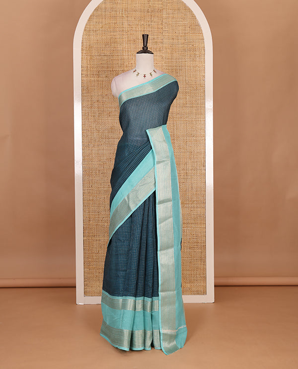 Blue Checked saree with contrast zari border and contrast striped pallu along with contrast blouse