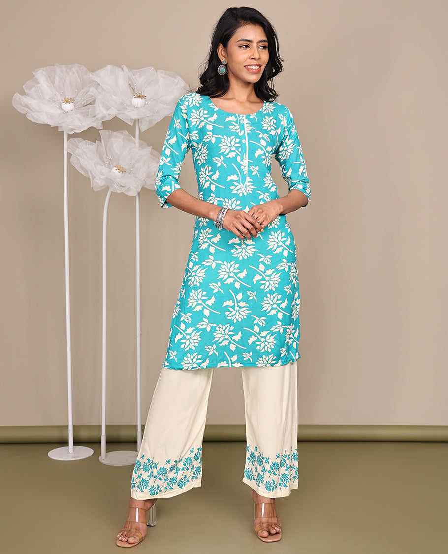 Blue Cotton Ready-Made Suit, Featuring Floral Prints, a Round Neck, 3/4 Sleeves, and a Straight-Cut Top, Paired with Floral Printed Straight-Cut Pants