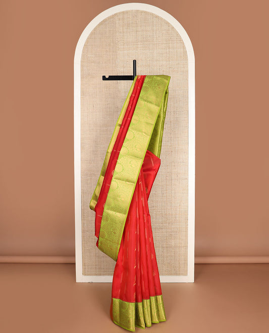 Red zari buttas vasundhara silk mix saree, contrast scallop pallu & border of floral, peacock & chakra motifs