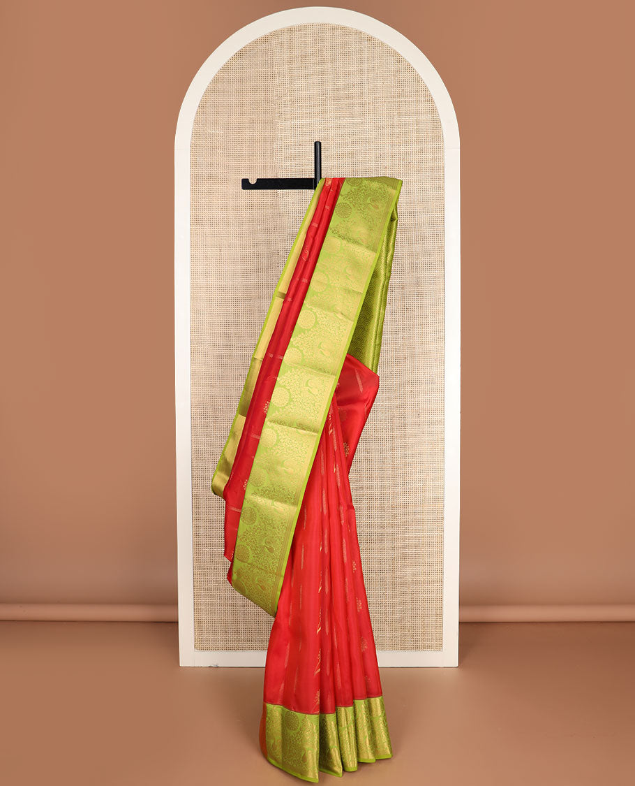 Red zari buttas vasundhara silk mix saree, contrast scallop pallu & border of floral, peacock & chakra motifs
