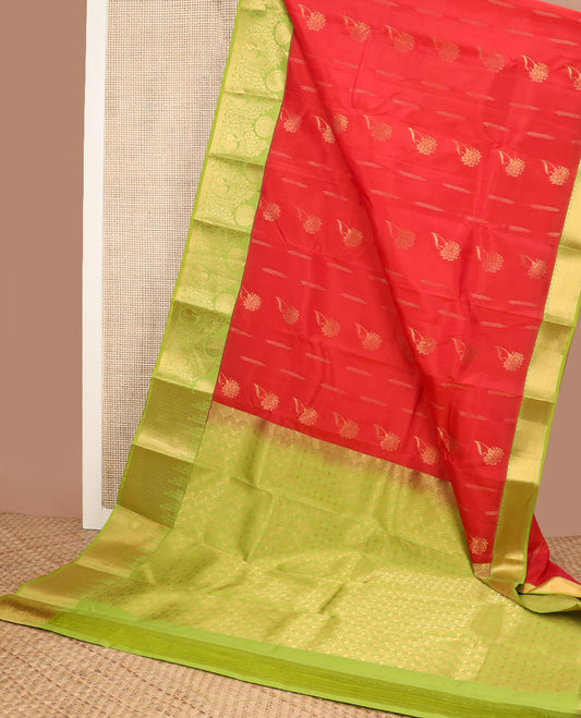 Red zari buttas vasundhara silk mix saree, contrast scallop pallu & border of floral, peacock & chakra motifs