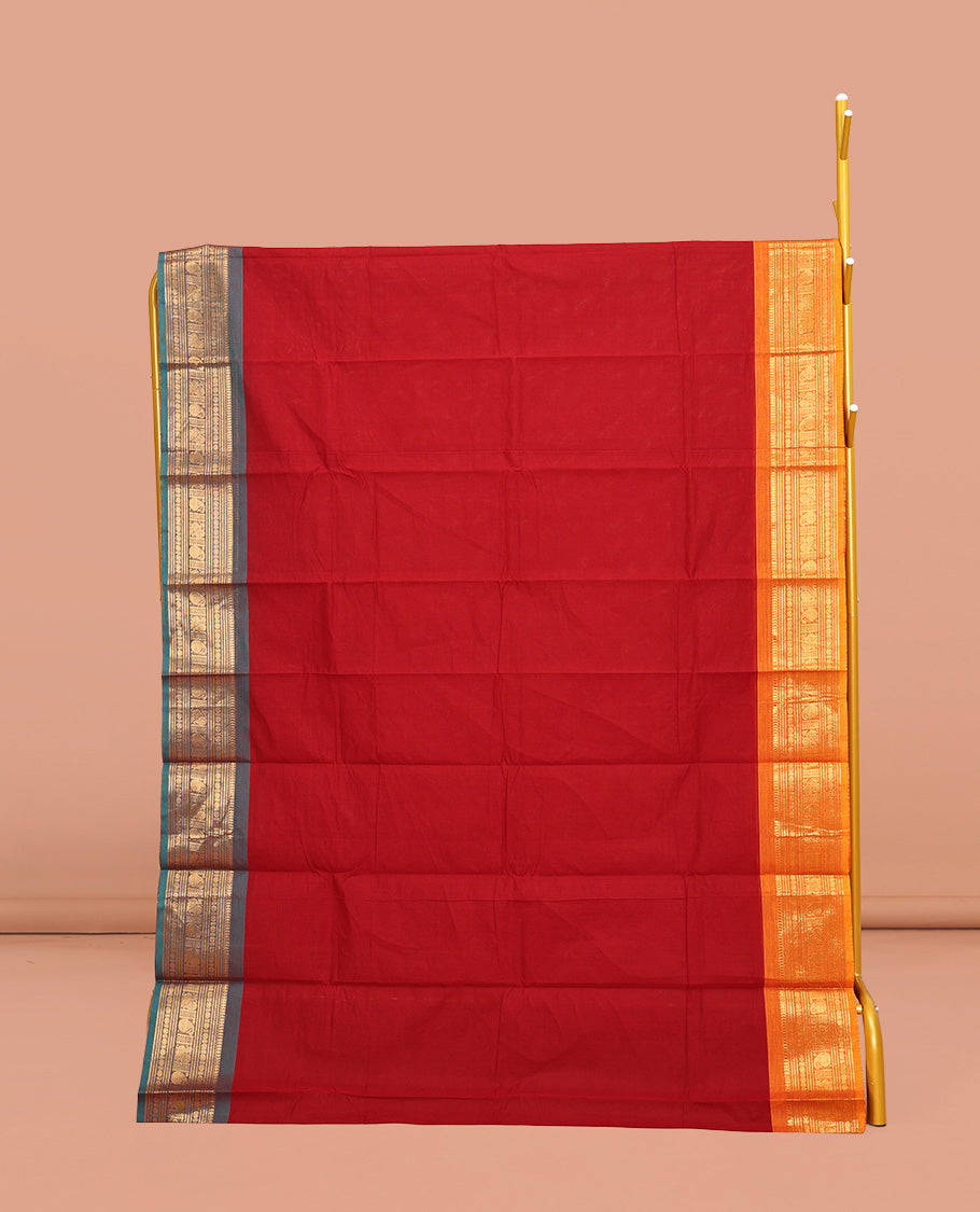 Red Plain Chettinad Cotton Saree, Complemented by a Contrast Traditional Zari Design Ganga-Jamuna Border, Pallu of Stripes, and Paired with a Matching Blouse