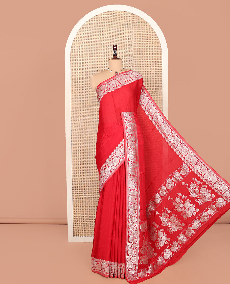 Red Plain Fancy Crepe Saree, Highlighted by a Floral Border, Pallu of Floral Designs, and a Matching Blouse