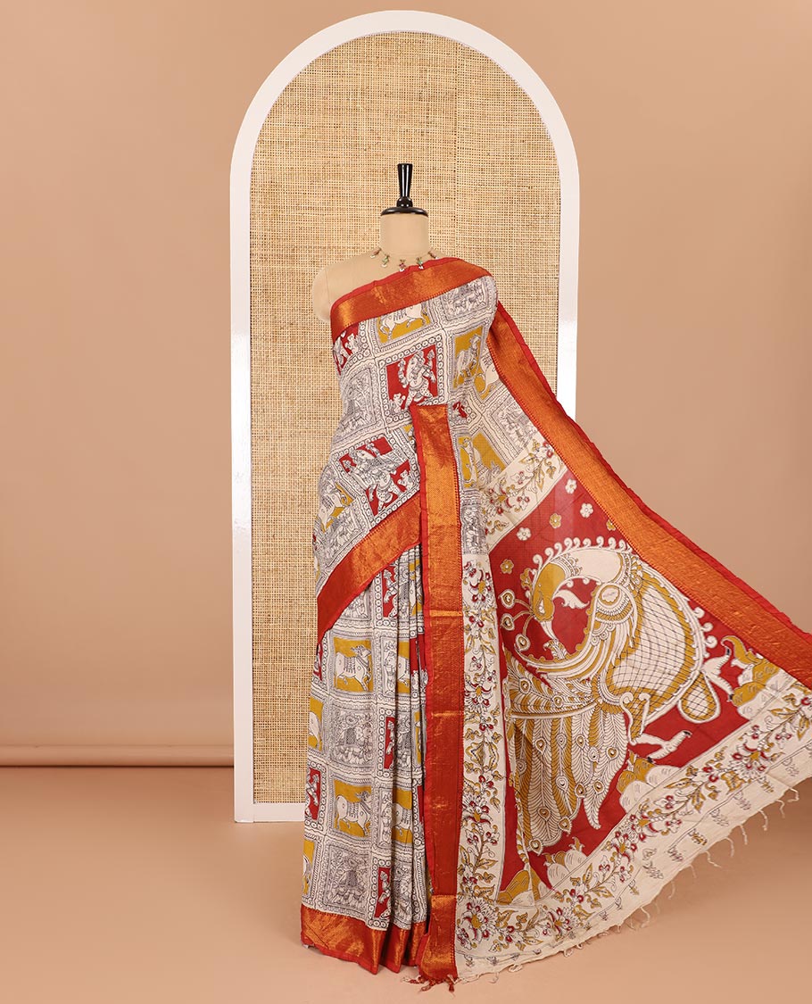 Maroon Pichwai cow, elephant, and Vinayagar motifs enclosed checked printed Mangalagiri cotton saree with contrast mayil kann zari borders, kalamkari printed pallu, and a floral vine printed blouse