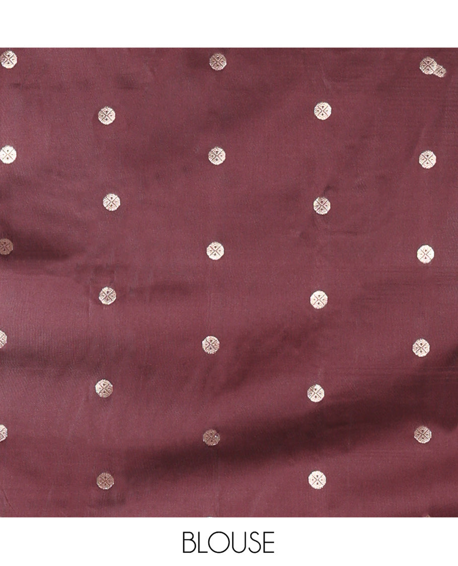 Brown Kanchi Soft Silk Saree, Enriched with Zari Buttas All Over Its Body, Highlighted by Traditional Zari Rettai Pettu Border, Intricately Designed Pallu, and Paired with a Matching Blouse