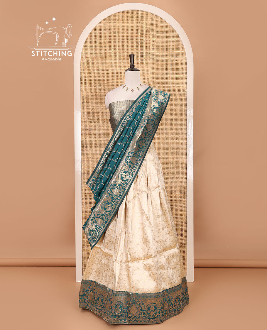 Cream-ramar blue semi-banaras half-saree, floral jaal jacquard & contrast traditional zari border skirt, floral jacquard blouse & contrast zari design blouse