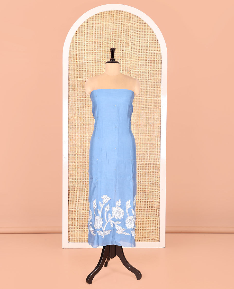 Blue Mul Chanderi Material Chudidar Set, Adorned with Appliqué Floral Embroidery on Its Top, a Plain Santoon Bottom, and Paired Scallop Embroidered Mul Chanderi Dupatta
