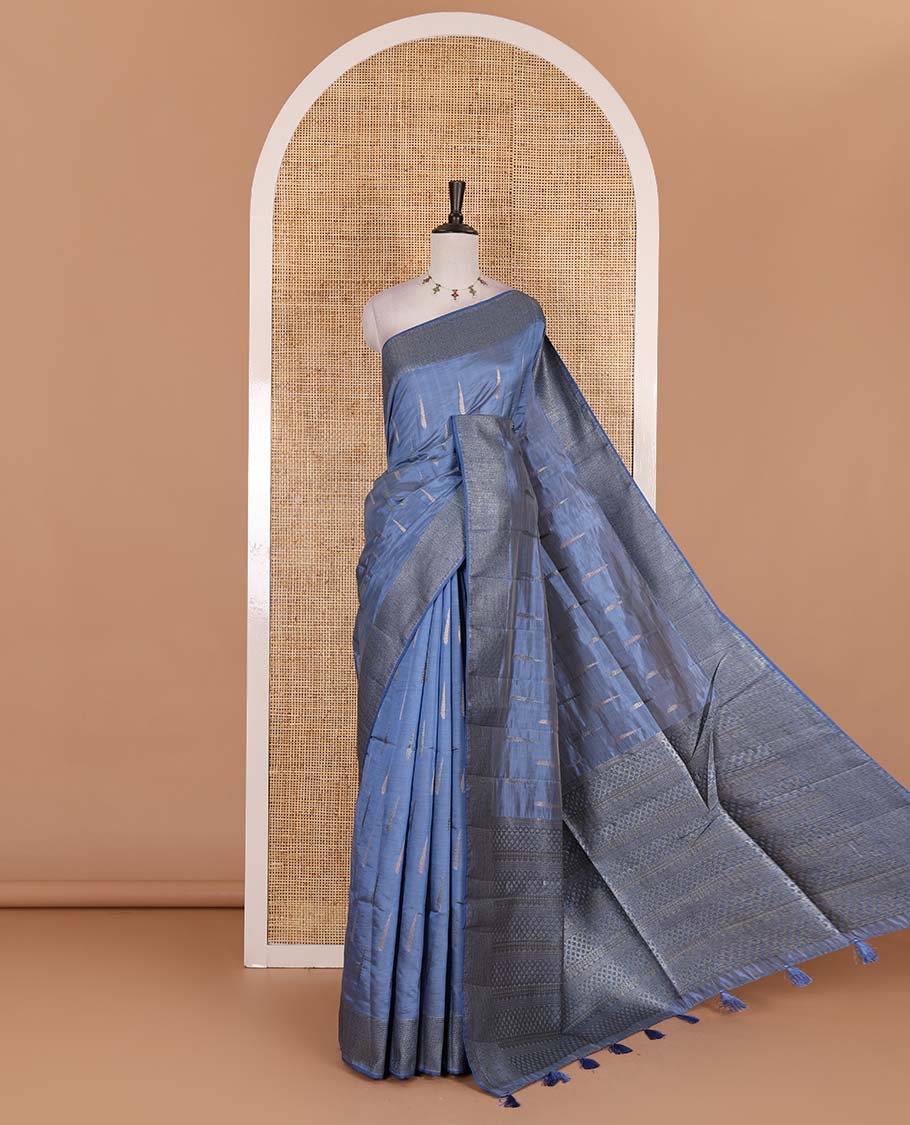 Blue buttas woven semi-tussar saree, zari border, geometric patterned pallu, and a matching blouse