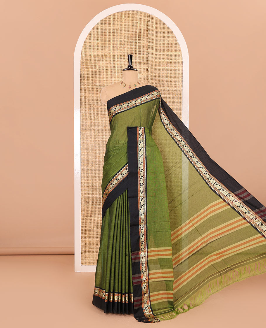 Olive plain mercerised cotton saree, contrast kal erangina thread border of elephant motifs, striped pallu, and a matching blouse