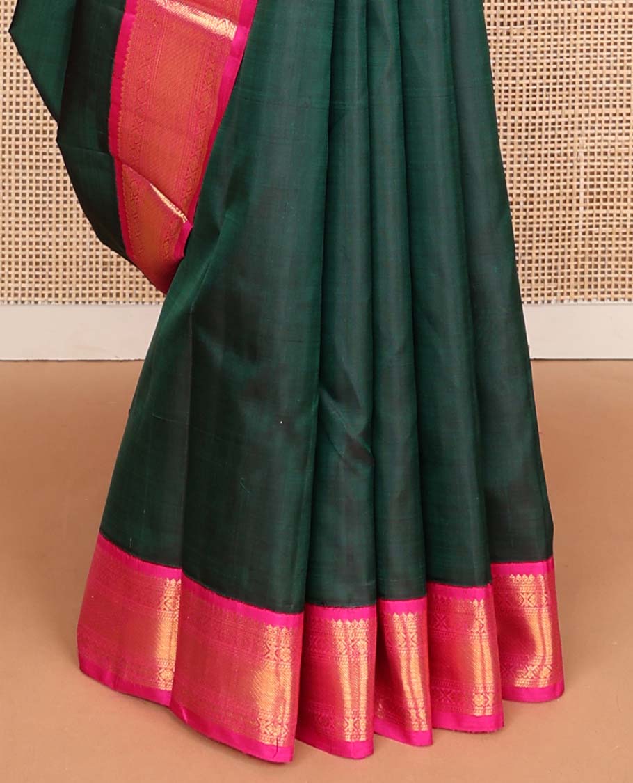 Green plain Kanchipuram korvai silk saree, contrast neer korvai border of thilakam mokku, banaras, muthu, and laddu kamalam, and jaal pallu