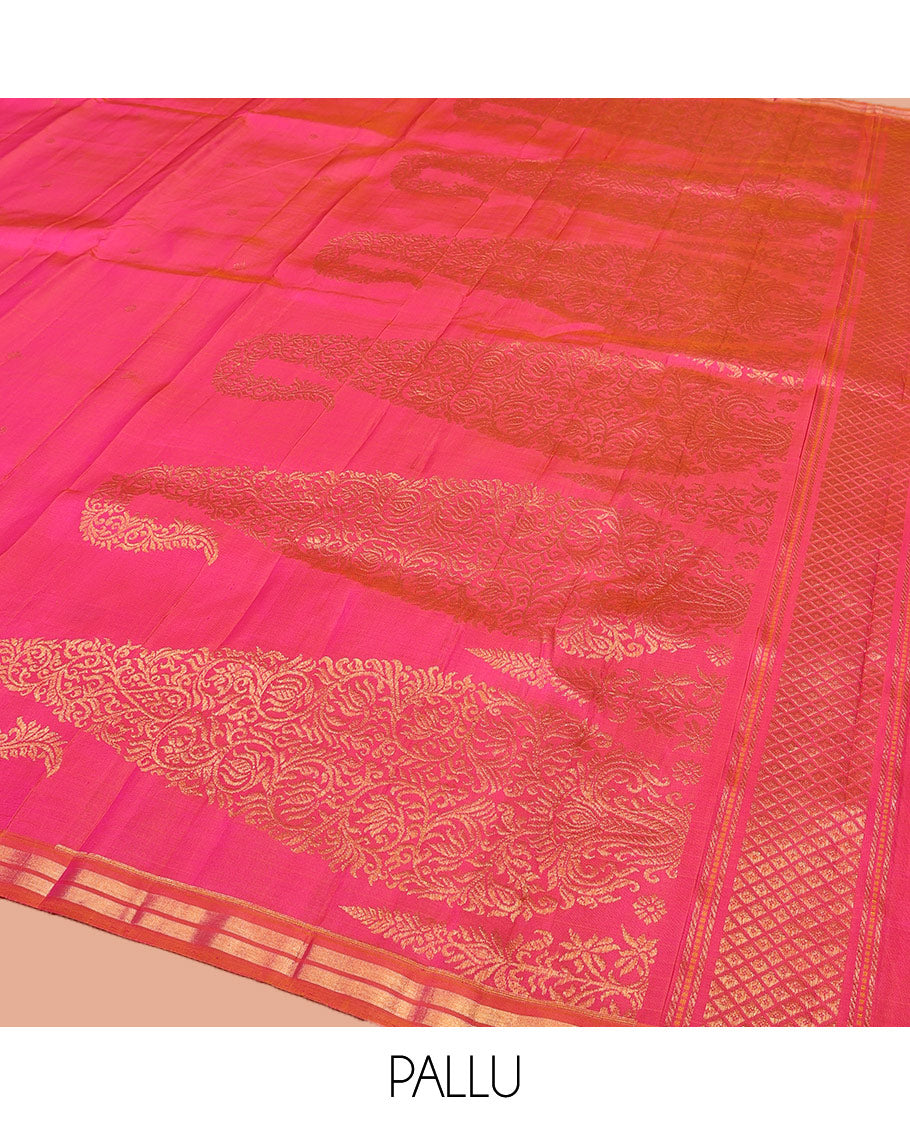 Pink Kanchipuram Silk Saree, Decked Up with Zari Buttas All Over Its Body, Complemented by Contrast Zari Piping Border, Pallu of Big Paisleys, and Paired with a Matching Blouse