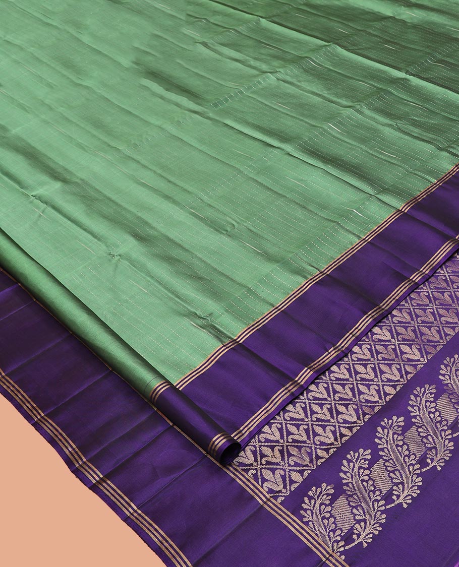 Green Mayuri Lite Silk Mix Saree, Sparsely Sparkled with Muthu Stripes on Its Body, Complemented by a Contrast Border, Jaal Pallu, and Paired with a Contrast Blouse